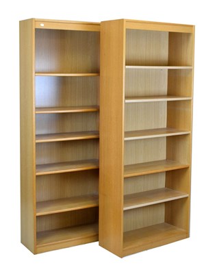 Lot 577 - Pair of modern oak open front bookcases