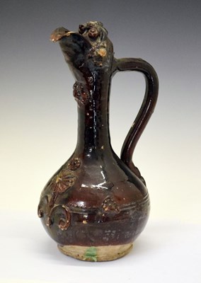 Lot 261 - 19th Century Ottoman Turkish Canakkale brown-glazed pottery ewer