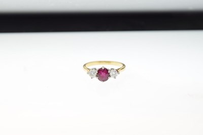 Lot 21 - Ruby and diamond three stone ring