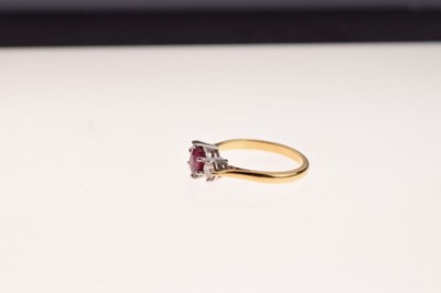Lot 21 - Ruby and diamond three stone ring