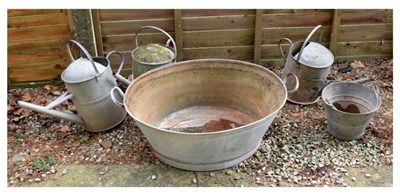 Lot 624 - Tin bath, tin watering cans, and bucket