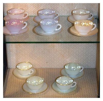 Lot 461 - French 1950s opaline glass cups and saucers