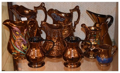 Lot 581 - Quantity of Victorian copper lustre jugs, etc