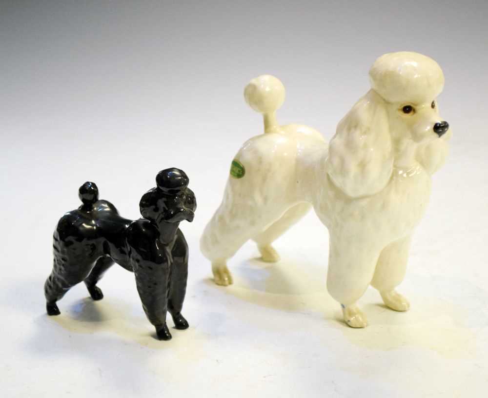 Lot 258 - Two Beswick Poodles