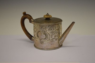 Lot 104 - George III silver teapot with later embossed rococo decoration