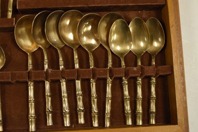 Lot 559 - Cased Thai bronze bamboo-effect canteen of cutlery