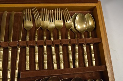 Lot 559 - Cased Thai bronze bamboo-effect canteen of cutlery