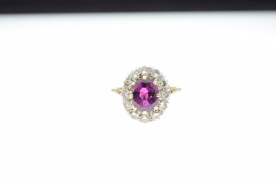 Lot 24 - Ruby and diamond cluster ring