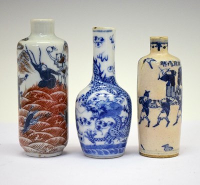 Lot 228 - Three Chinese porcelain miniature vases or scent bottles