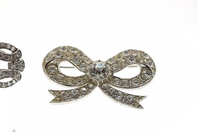 Lot 95 - Pair of Christian Dior ear clips, clip brooch, and a ribbon brooch