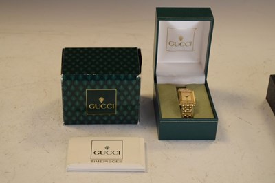 Lot 111 - Gucci gold plated dress watch, with Roman dial bezel, with box and papers