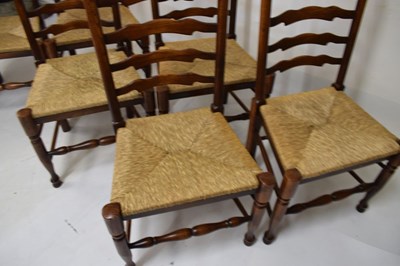 Lot 661 - Good quality rustic dining suite comprising table and six ladderback chairs