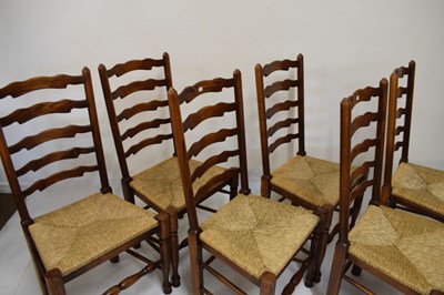 Lot 661 - Good quality rustic dining suite comprising table and six ladderback chairs