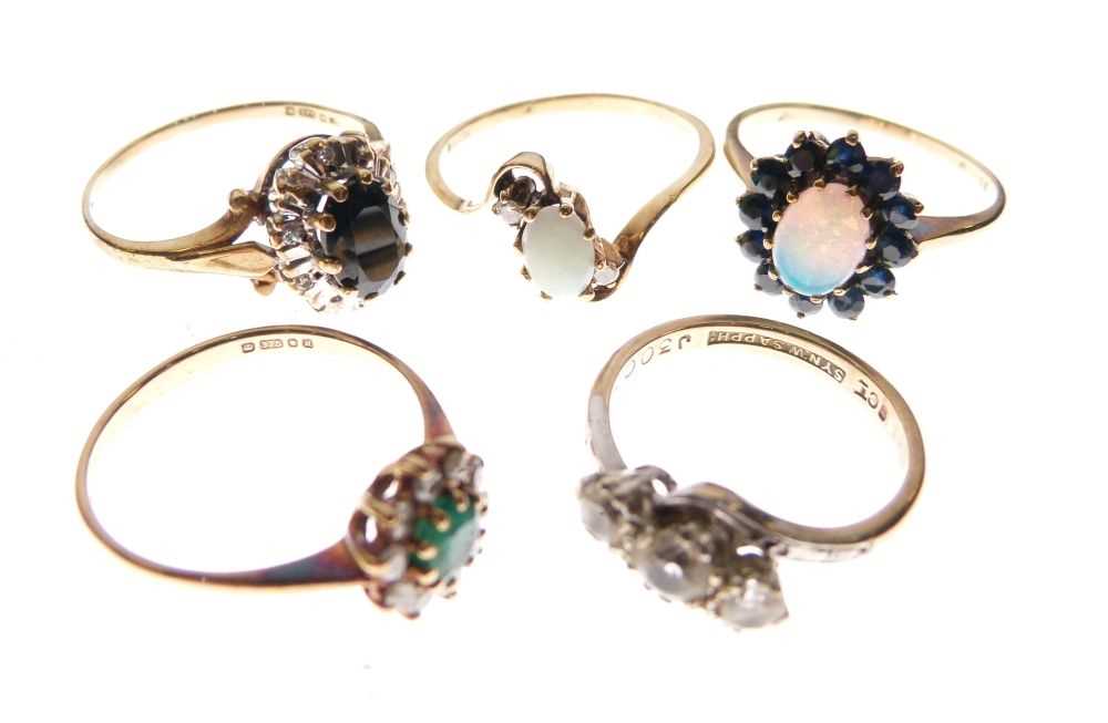 Lot 59 - Five gem set dress rings