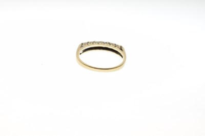 Lot 32 - 9ct gold diamond half hoop ring