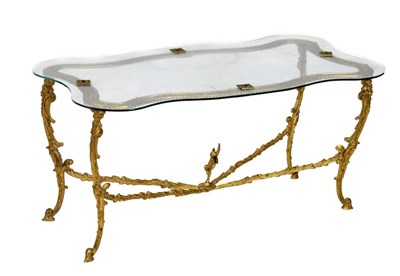 Lot 566 - Glass top coffee table