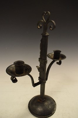 Lot 207 - Wrought iron adjustable two-branch candlestick