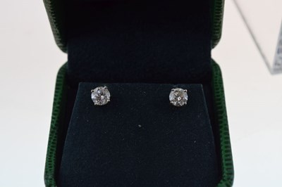 Lot 35 - Pair of single stone diamond 18ct white gold earstuds