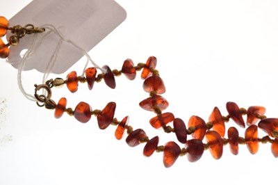 Lot 43 - Two amber bead necklaces