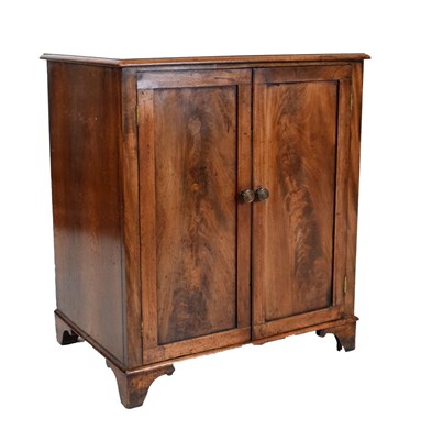 Lot 527 - Mahogany two door cupboard