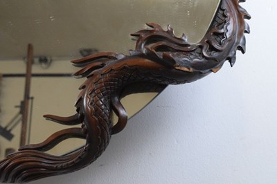 Lot 452 - Carved mirror with dragon decoration, circa 1900