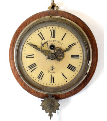 Lot 377 - French brass bulkhead-style wall clock