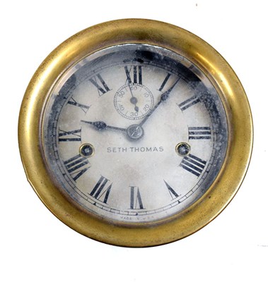 Lot 364 - American brass bulkhead-style wall clock