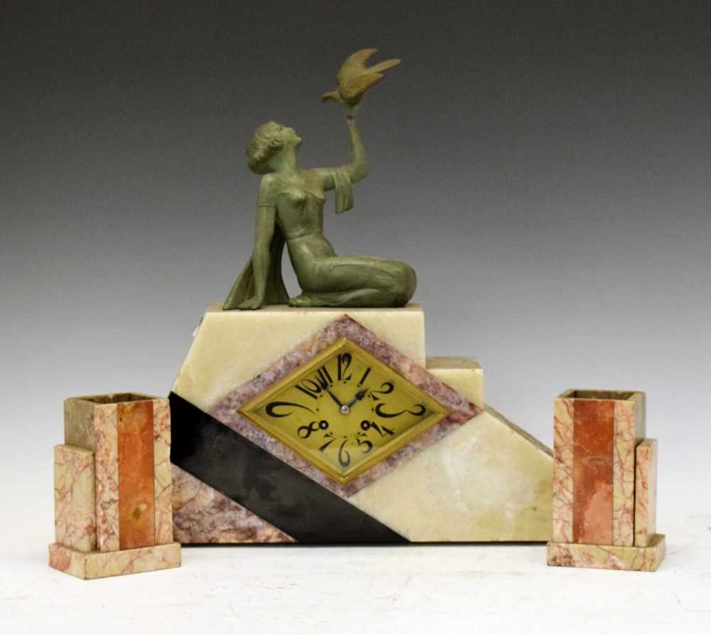 Lot 331 - French Art Deco onyx, marble and patinated metal clock garniture