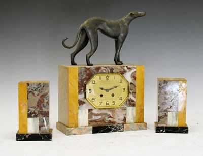 Lot 341 - French Art Deco onyx, marble and patinated metal clock garniture