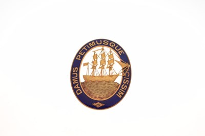 Lot 65 - Guyanese yellow metal and enamel badge
