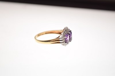 Lot 30 - 9ct gold cluster ring set three oval cut amethysts and diamonds
