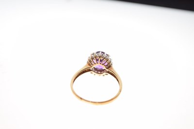 Lot 29 - 9ct gold cluster ring set oval cut amethyst, and diamonds