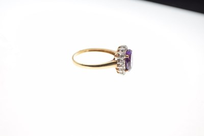 Lot 29 - 9ct gold cluster ring set oval cut amethyst, and diamonds