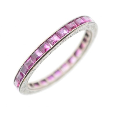 Lot 23 - Unmarked white metal and ruby eternity ring