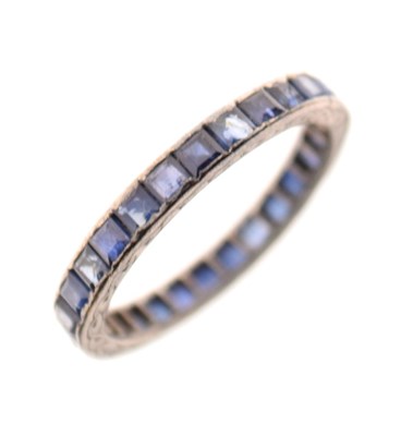 Lot 31 - Unmarked white metal and sapphire eternity ring