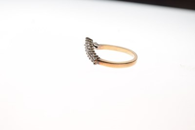 Lot 5 - 9ct gold diamond set wishbone eternity ring