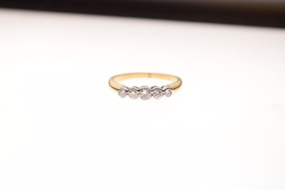 Lot 34 - Unmarked five-stone diamond eternity ring