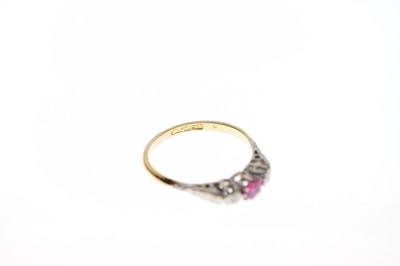 Lot 20 - '18ct & Plat', ruby and diamond three-stone ring
