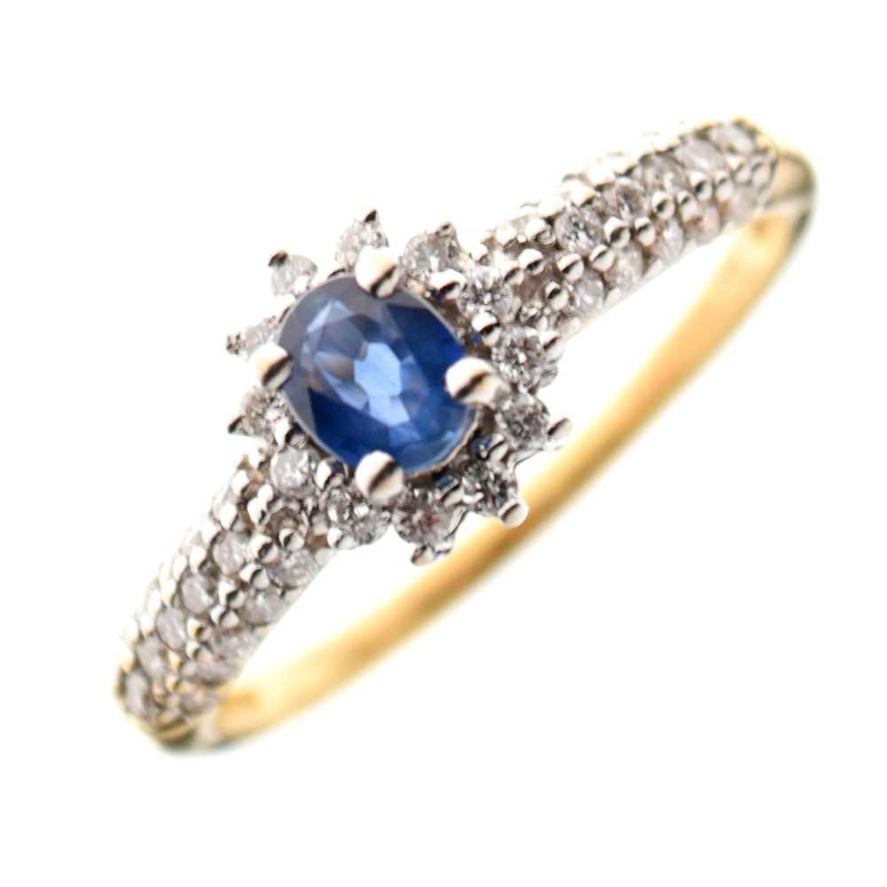 Lot 40 - 18ct gold, sapphire and diamond cluster ring
