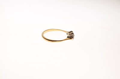 Lot 4 - '18c' yellow metal three-stone diamond ring