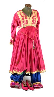 Lot 554 - Afghan Kuchi two-piece dress together with a pair of Pakistani Topson shoes