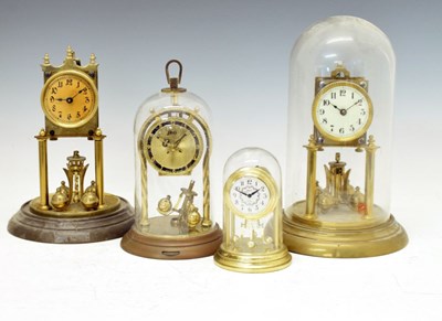 Lot 356 - Four mid 20th Century torsion or 'Anniversary' clocks