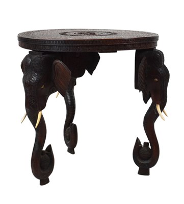 Lot 260 - Indian elephant-leg table