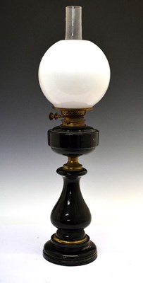 Lot 635 - Black glass paraffin/oil lamp