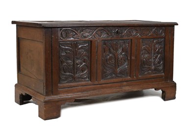 Lot 515 - Oak three-panel coffer with carved decoration