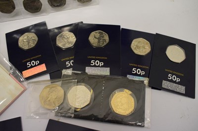 Lot 132 - Nine Beatrix Potter 50p presentation packs, together with a quantity of uncirculated 50ps