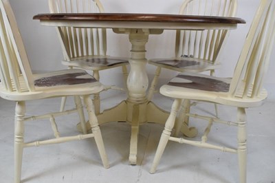 Lot 776 - Laura Ashley cream painted dining table and four chairs