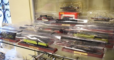 Lot 307 - Assorted model locomotives on wooden bases , to include boxed Hornby railway trackside accessories