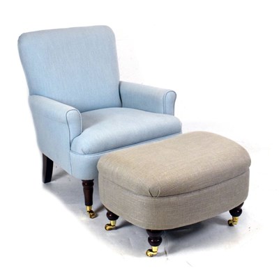 Lot 672 - Modern armchair and foot stool