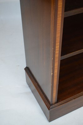 Lot 771 - Brights of Nettlebed reproduction inlaid mahogany low open bookcase